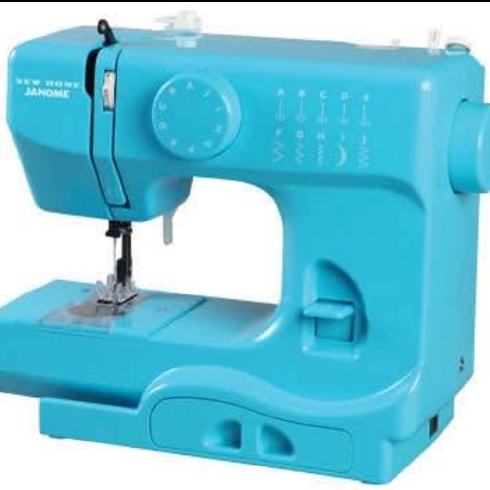Like New. Janome Blue Sewing Machine